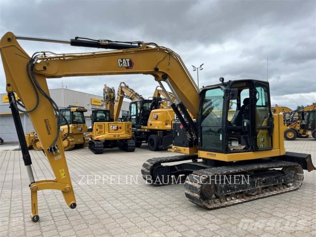 CAT 310 Bagri goseničarji