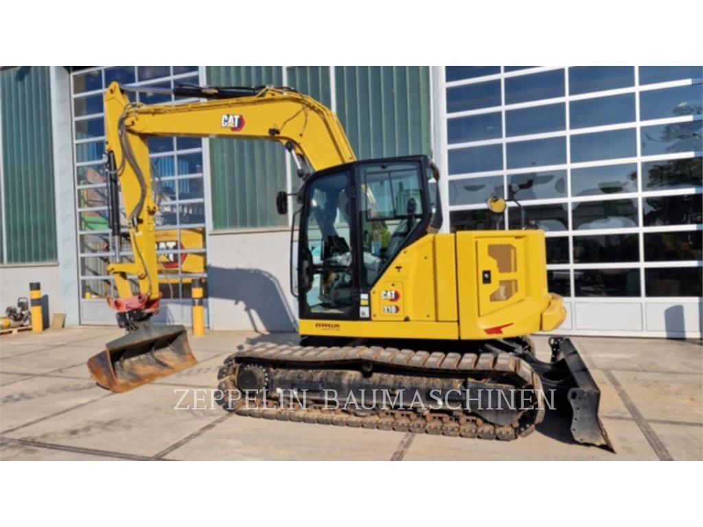 CAT 310 Bagri goseničarji