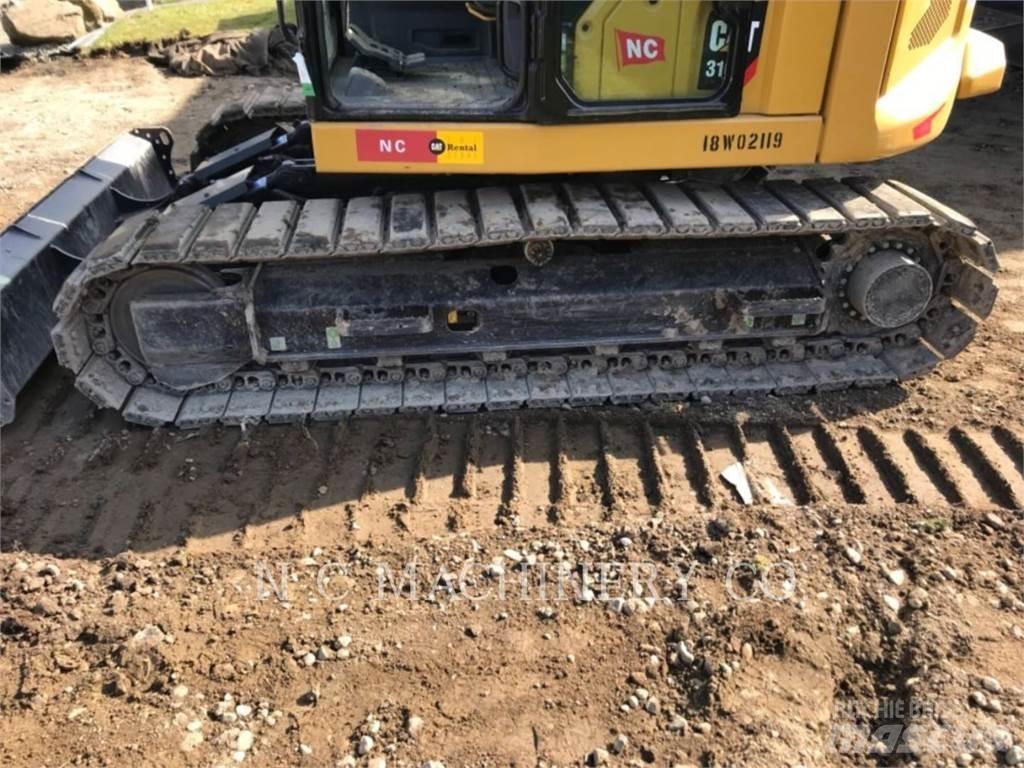 CAT 310 Bagri goseničarji