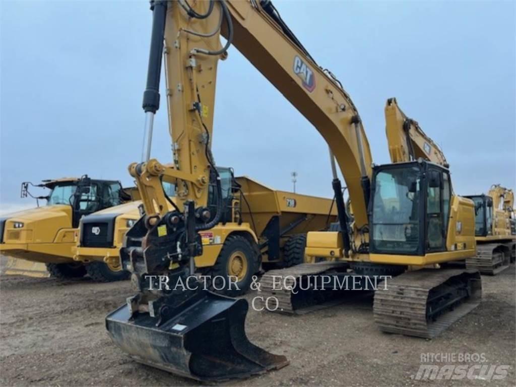 CAT 320 Bagri goseničarji