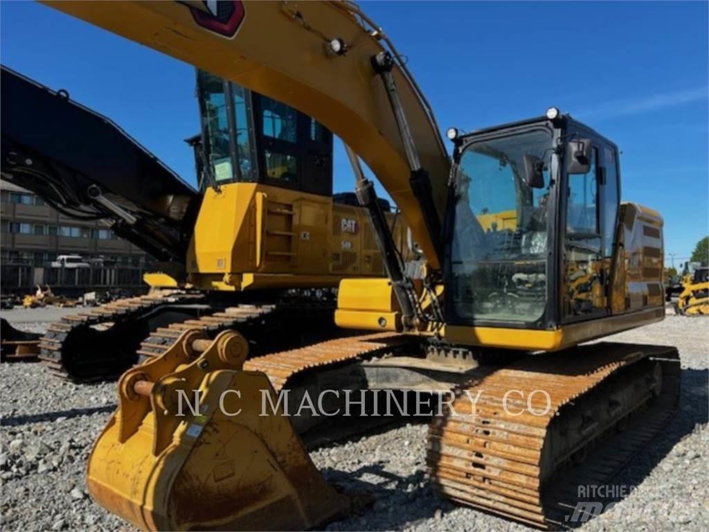 CAT 320 Bagri goseničarji