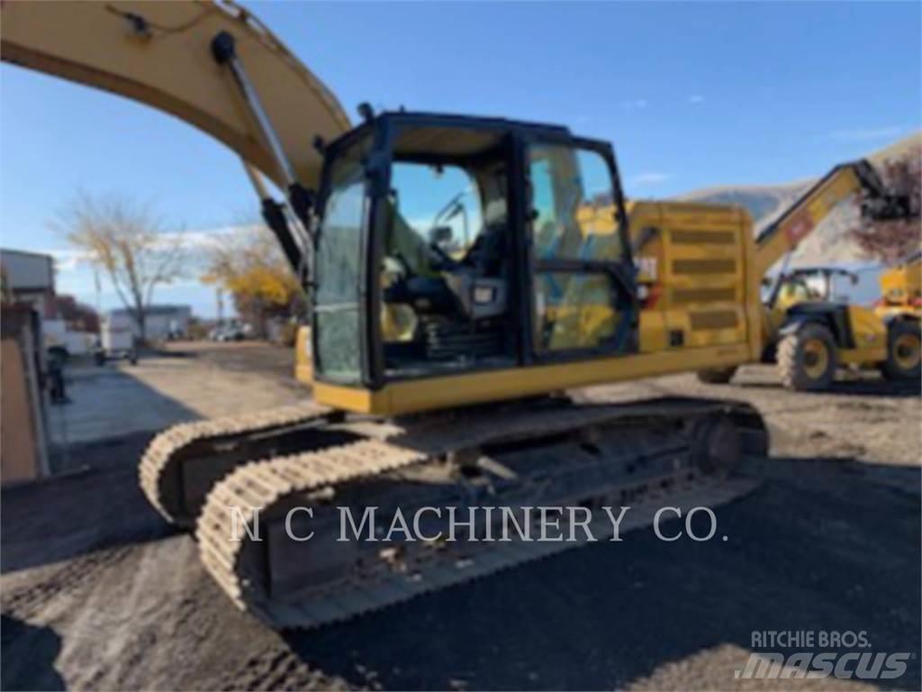 CAT 320 Bagri goseničarji