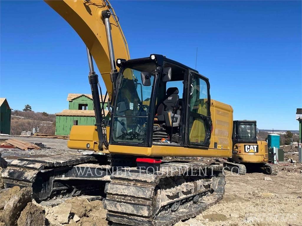 CAT 323 Bagri goseničarji