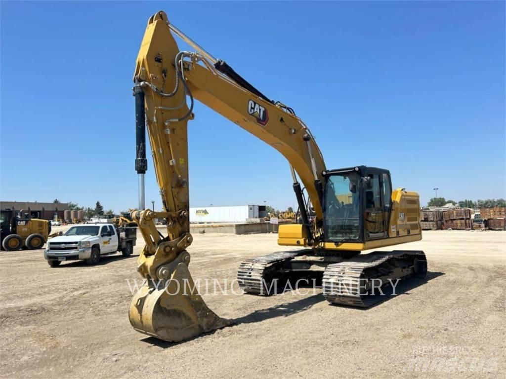 CAT 323 Bagri goseničarji
