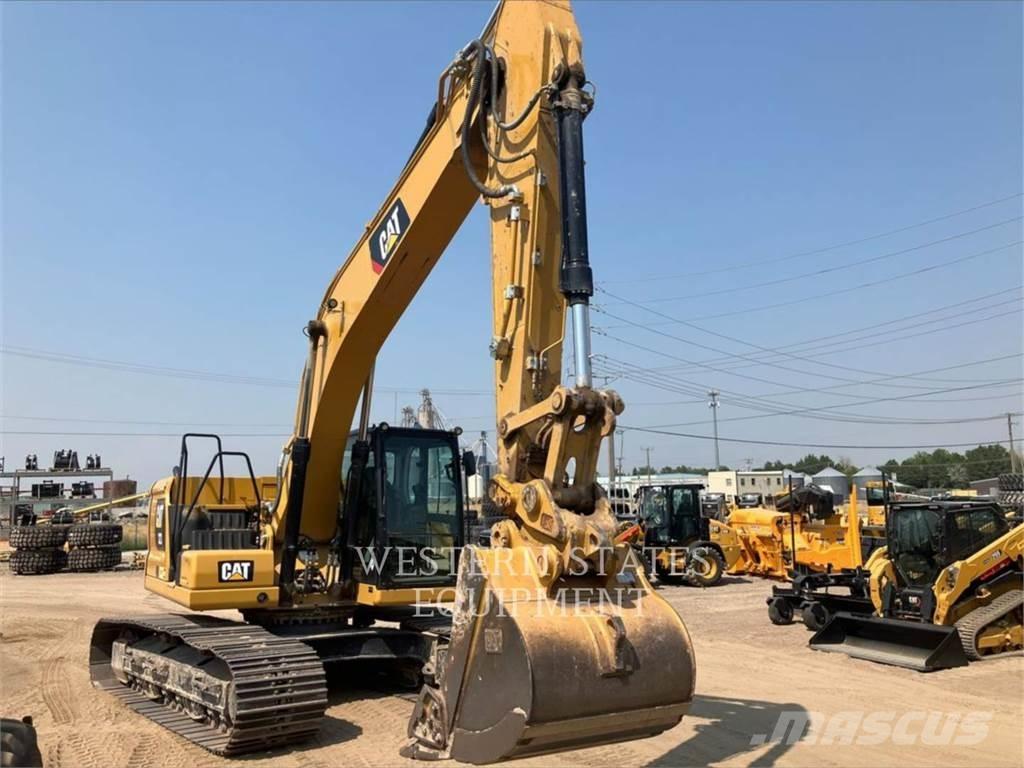 CAT 323 Bagri goseničarji