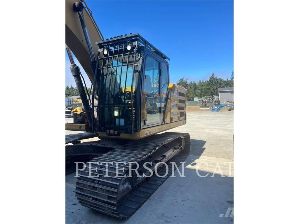 CAT 323 Bagri goseničarji