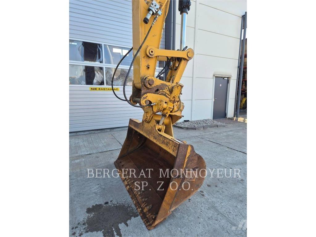 CAT 323 Bagri goseničarji