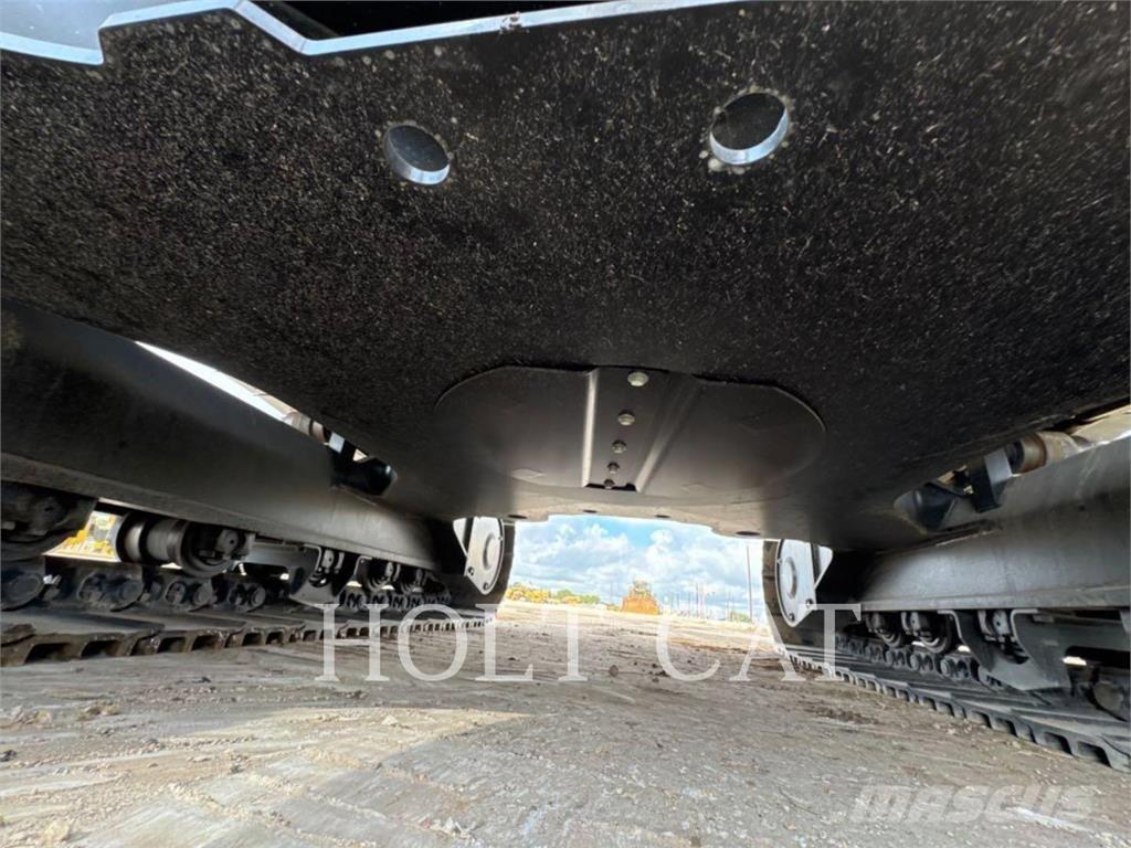 CAT 323 TC Kolesni nakladalci