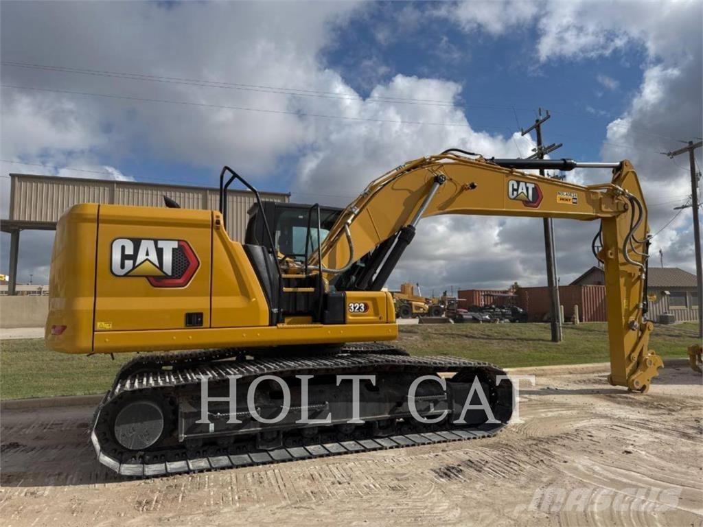 CAT 323 TC Kolesni nakladalci