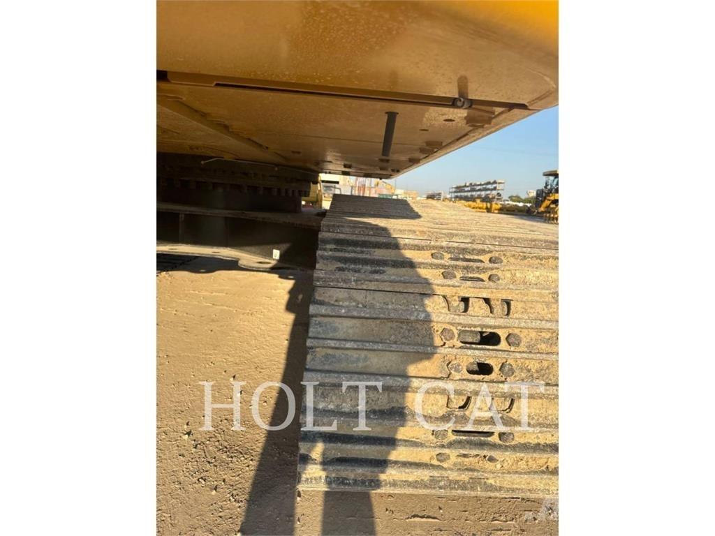 CAT 323 TC Kolesni nakladalci