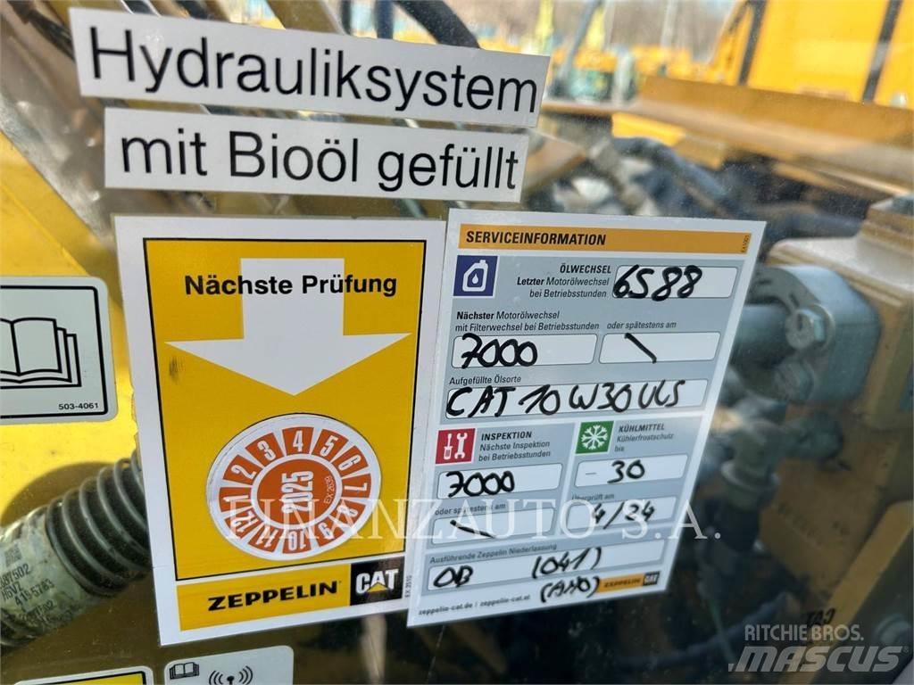 CAT 323E Bagri goseničarji