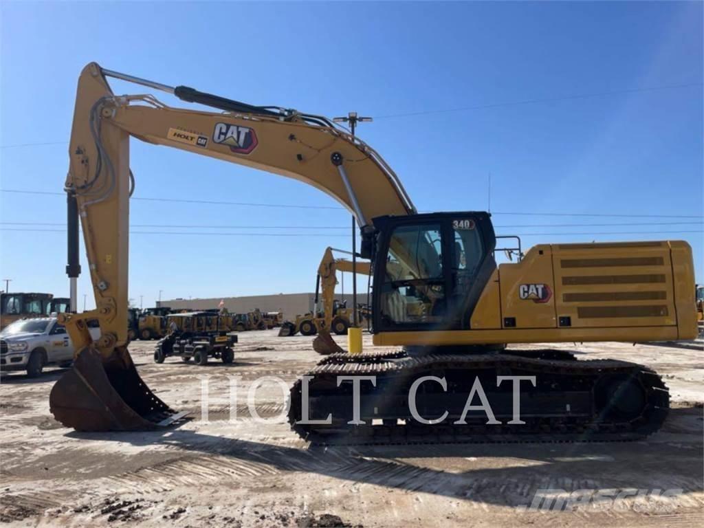 CAT 340 12 TC Kolesni nakladalci