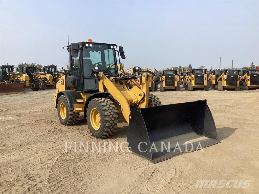 CAT 908 Kolesni nakladalci