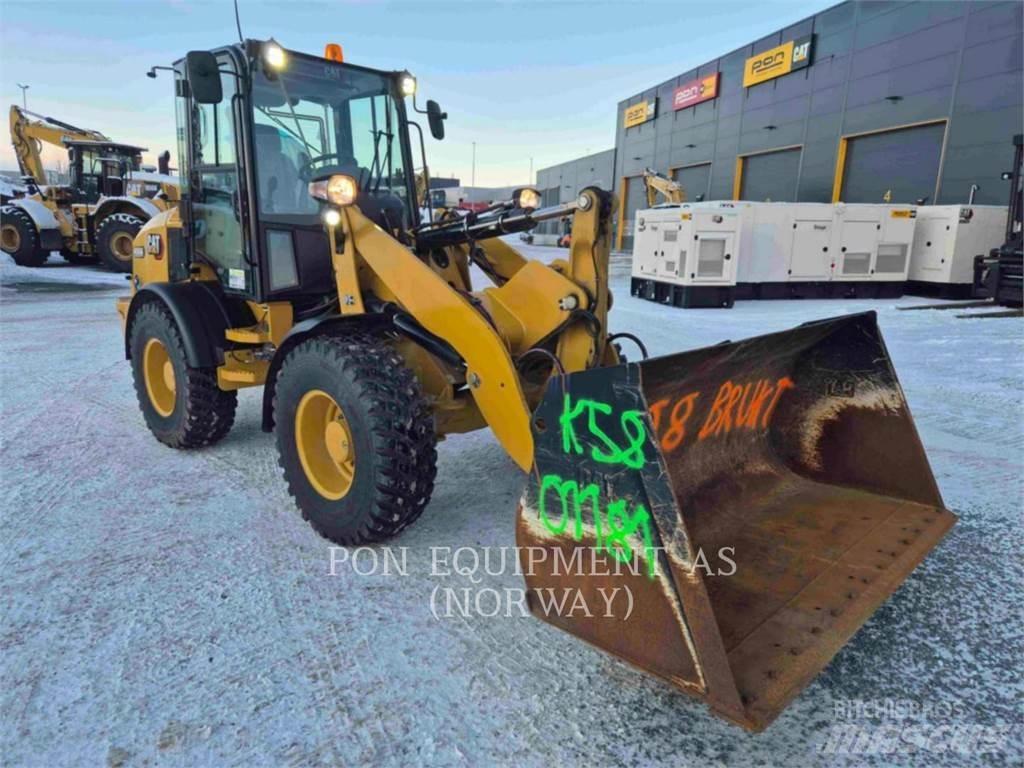 CAT 908M Kolesni nakladalci