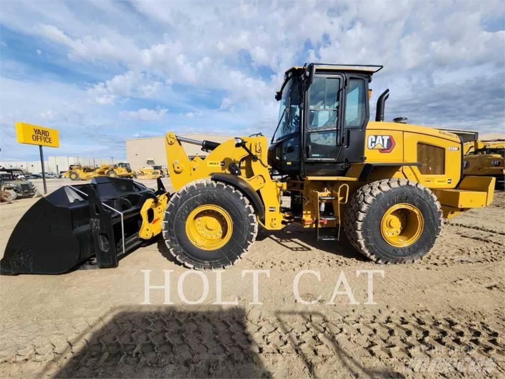 CAT 938M QC Kolesni nakladalci