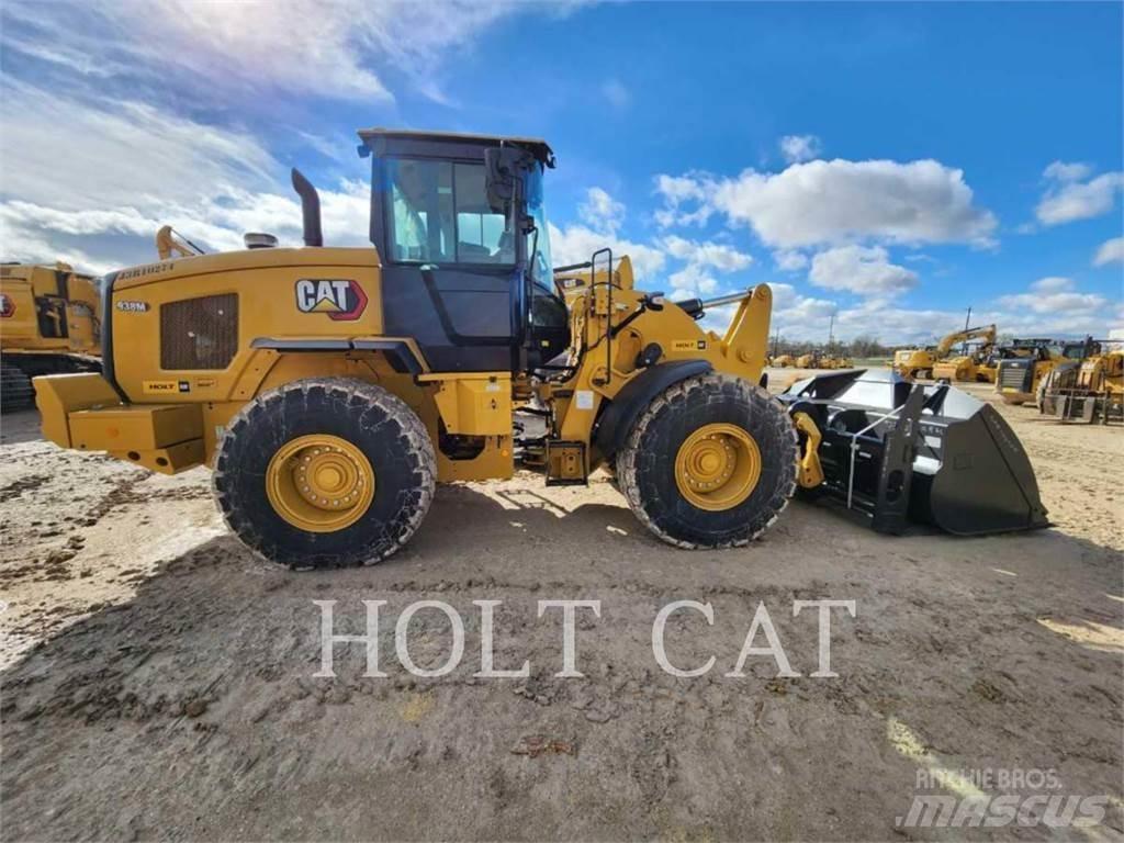 CAT 938M QC Kolesni nakladalci