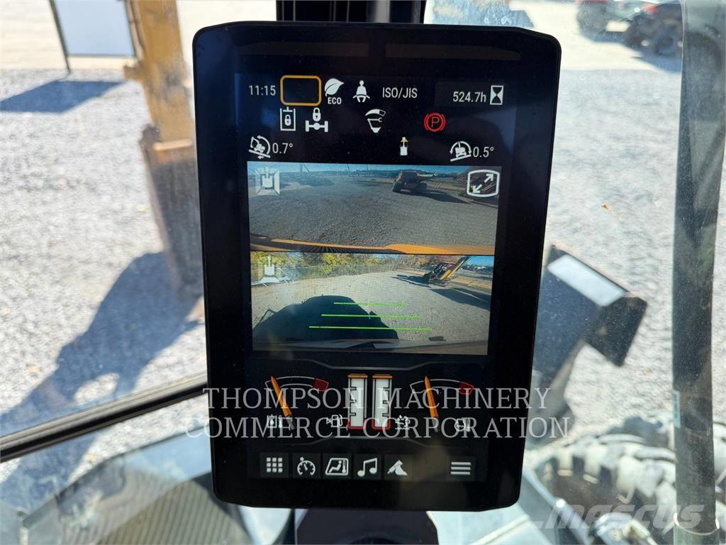 CAT M 318 Bagri na kolesih