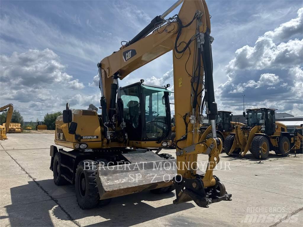 CAT M313D Bagri na kolesih