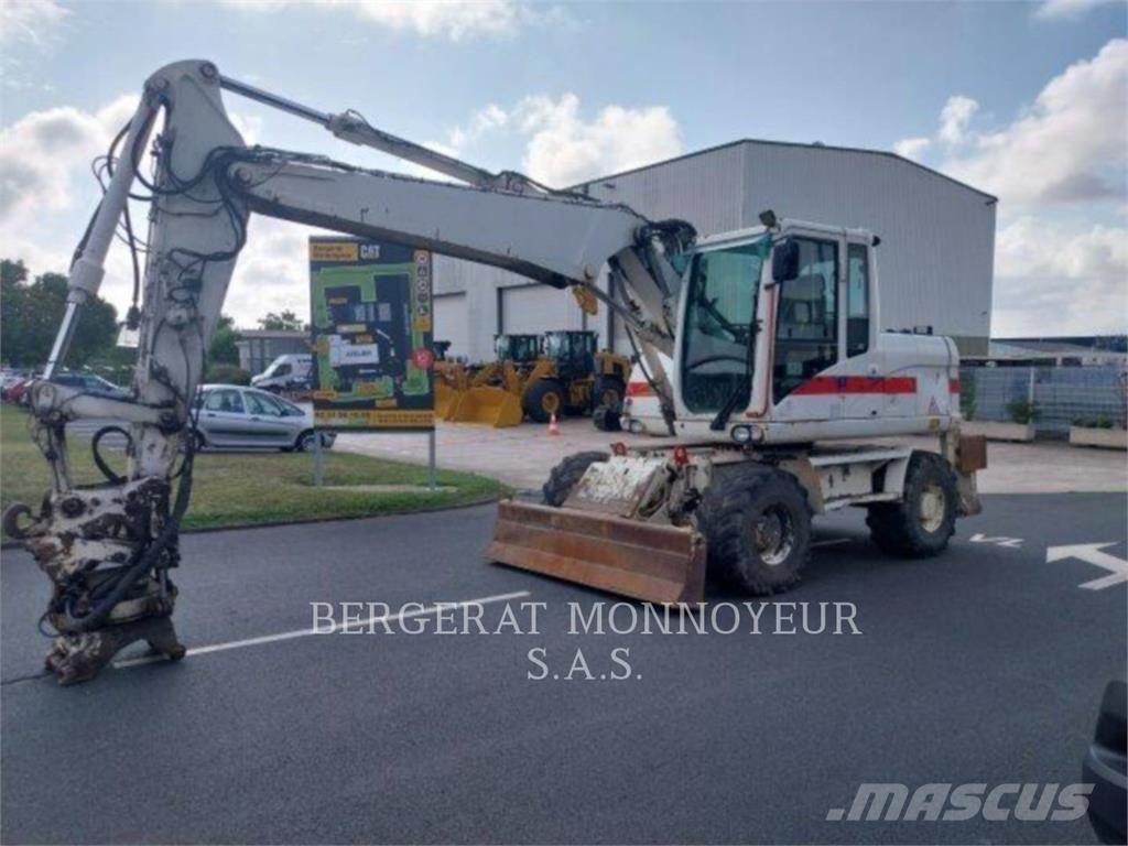 CAT M313D Bagri na kolesih