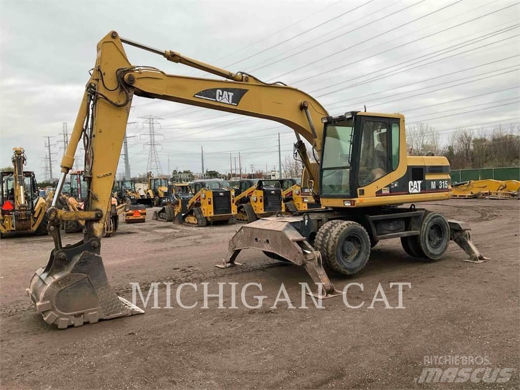 CAT M315 Bagri na kolesih
