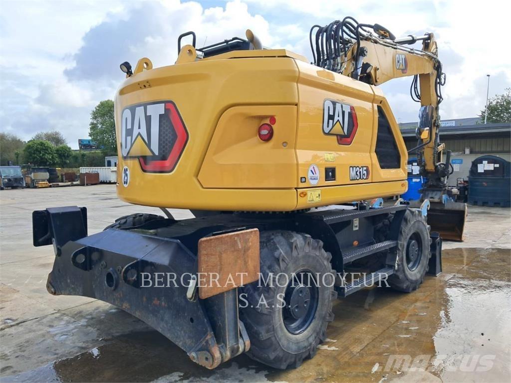 CAT M315 Bagri na kolesih