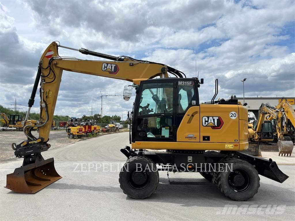 CAT M315F Bagri na kolesih