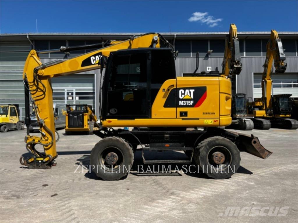 CAT M315F Bagri na kolesih