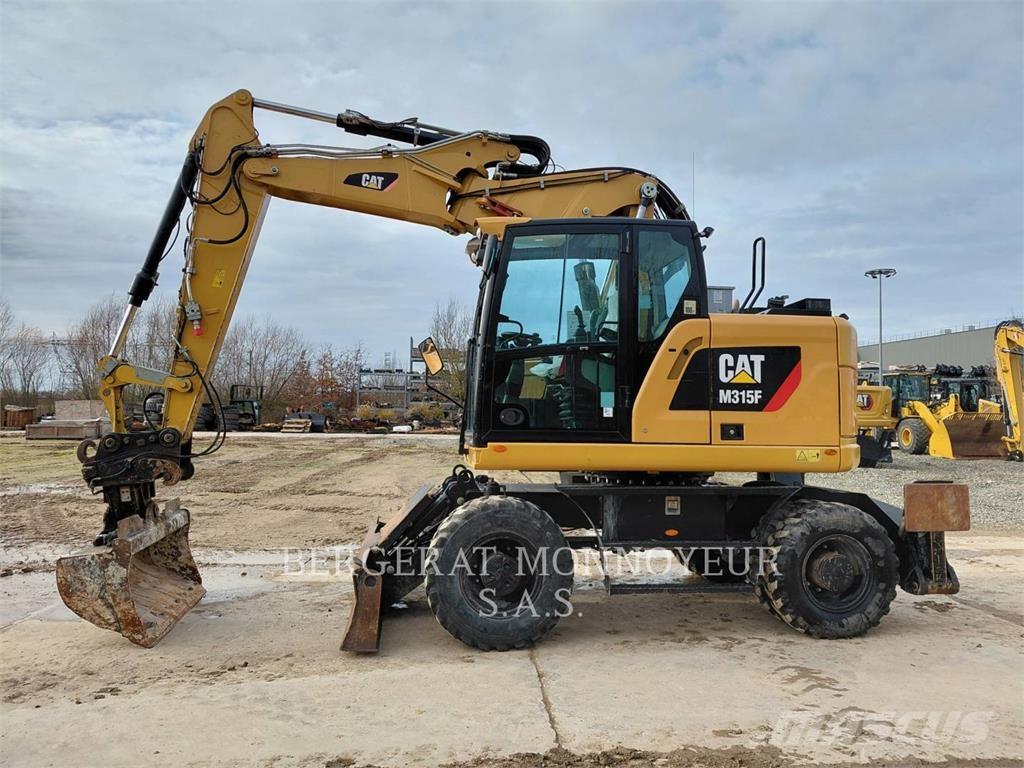 CAT M315F IVC Bagri na kolesih