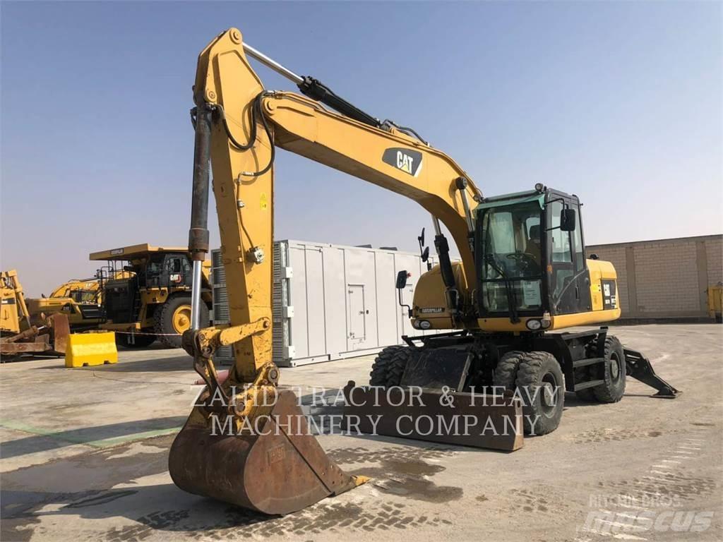 CAT M317D Bagri na kolesih