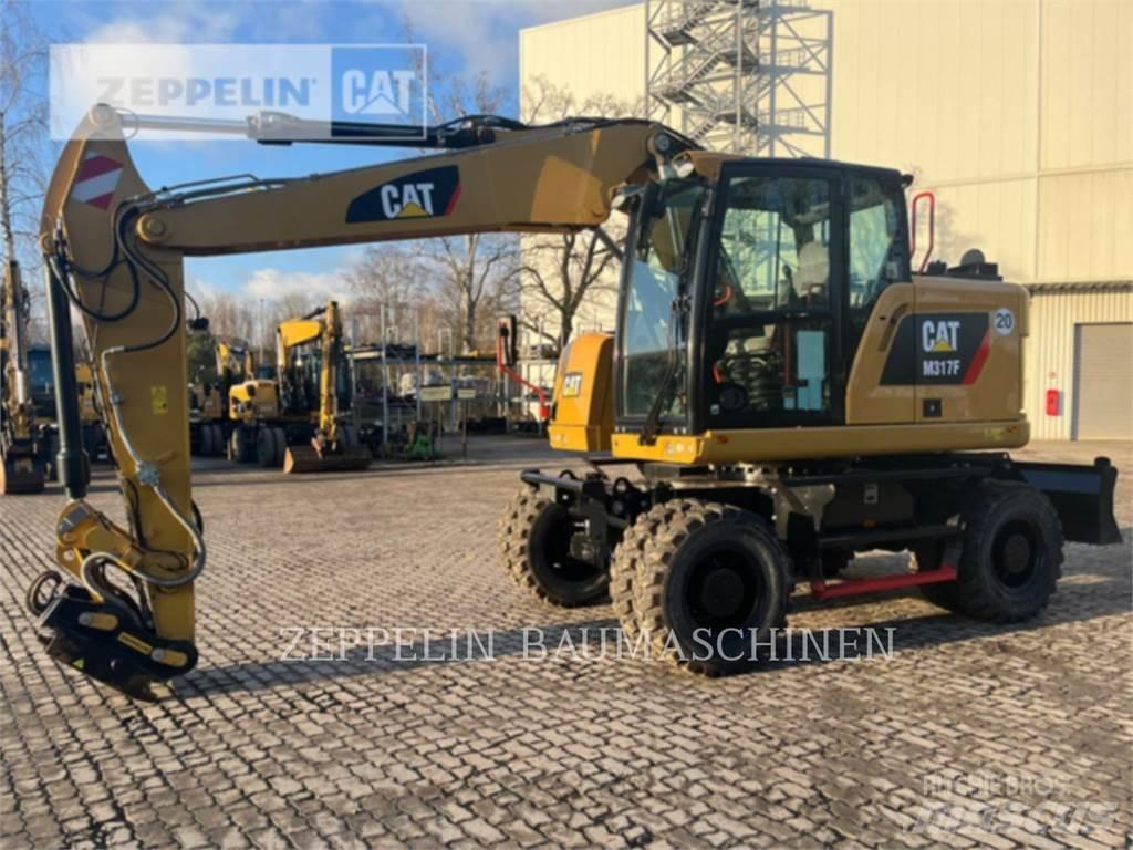 CAT M317F Bagri na kolesih