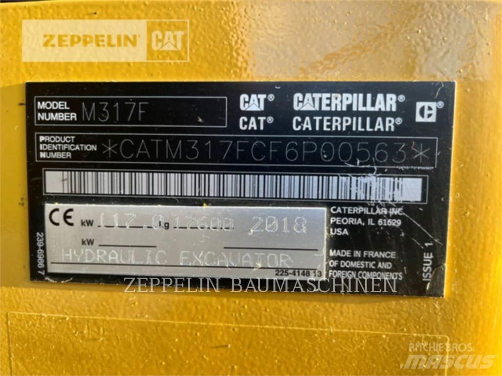 CAT M317F Bagri na kolesih