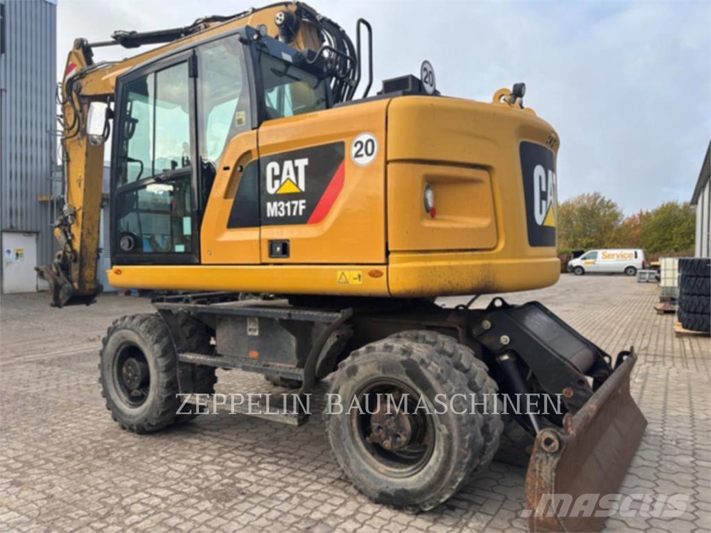 CAT M317F Bagri na kolesih