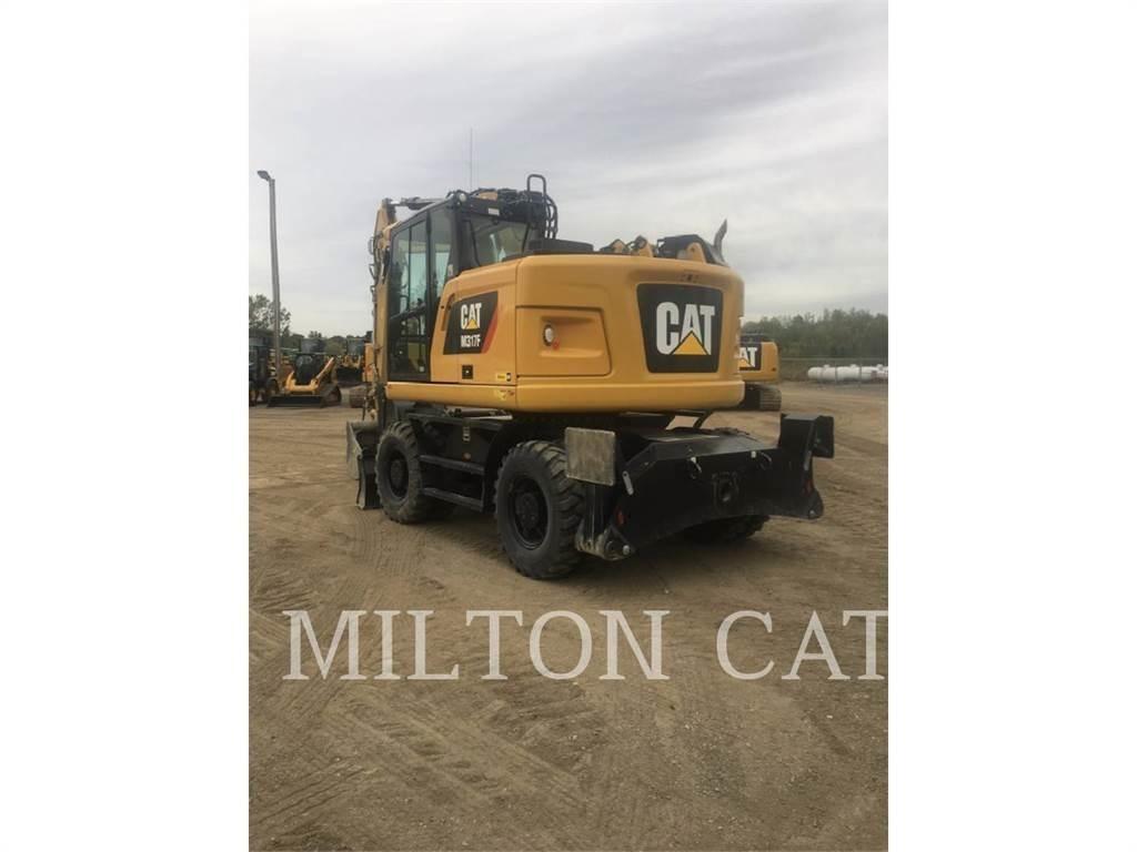 CAT M317F Bagri na kolesih