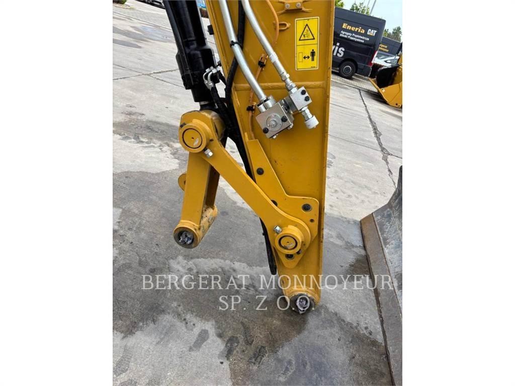 CAT M318 Bagri na kolesih