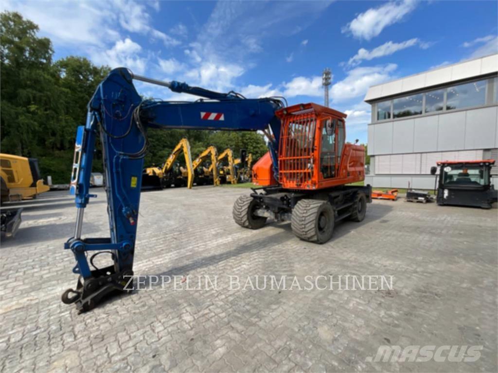 CAT M318-07A Bagri na kolesih