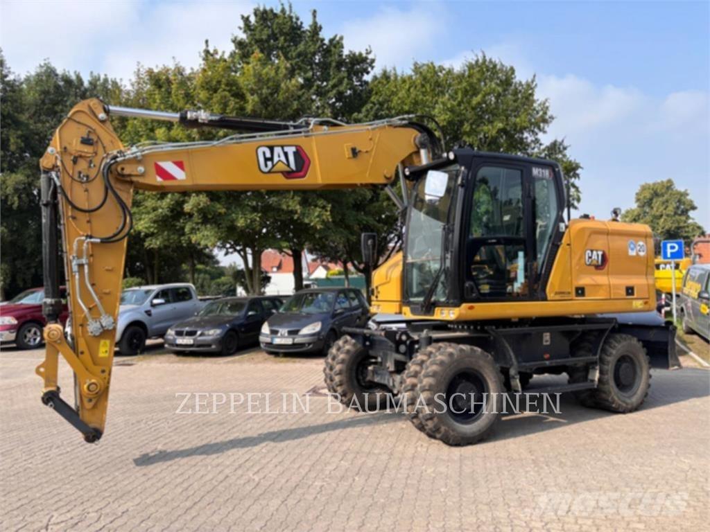 CAT M318-07A Bagri na kolesih
