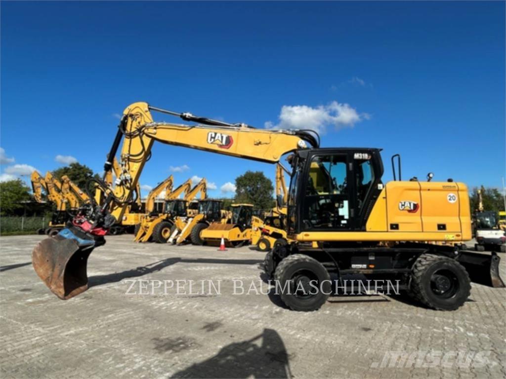 CAT M318-07A Bagri na kolesih