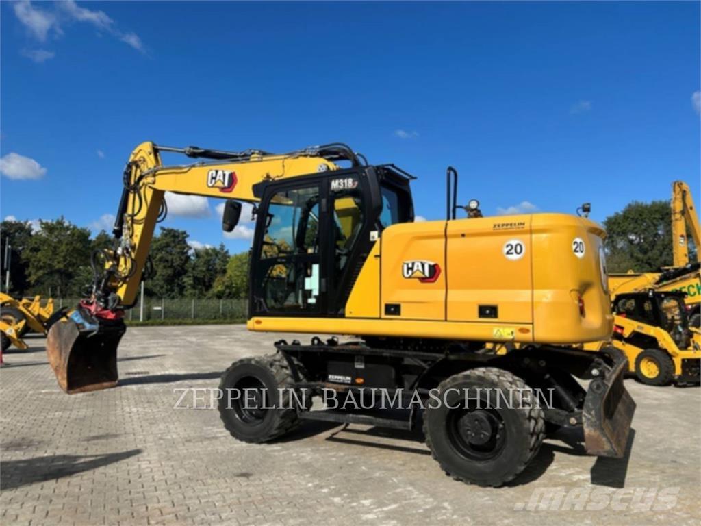 CAT M318-07A Bagri na kolesih