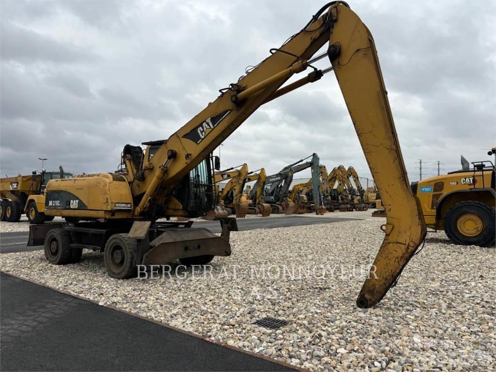 CAT M318C Bagri na kolesih