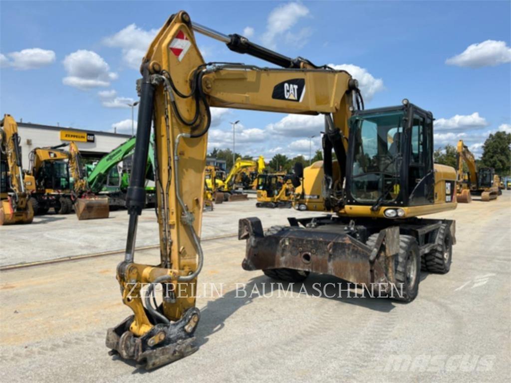 CAT M318D Bagri na kolesih