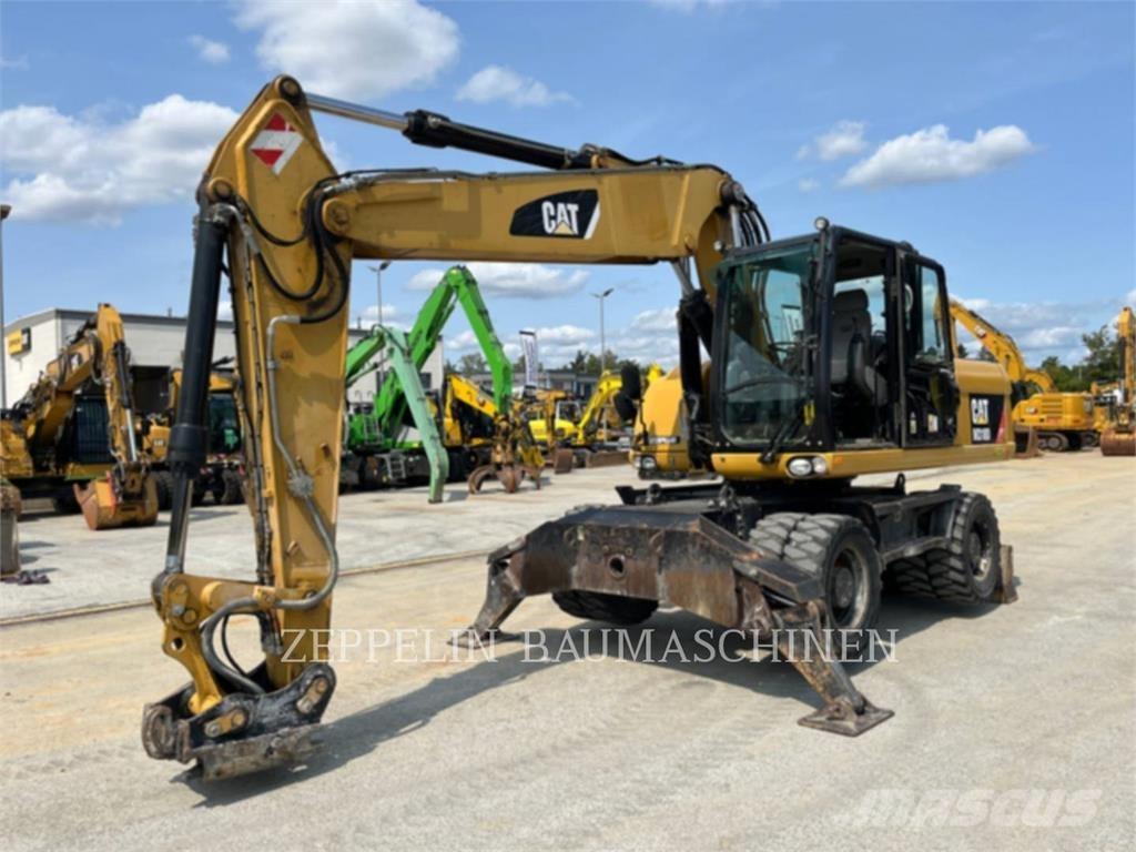 CAT M318D Bagri na kolesih
