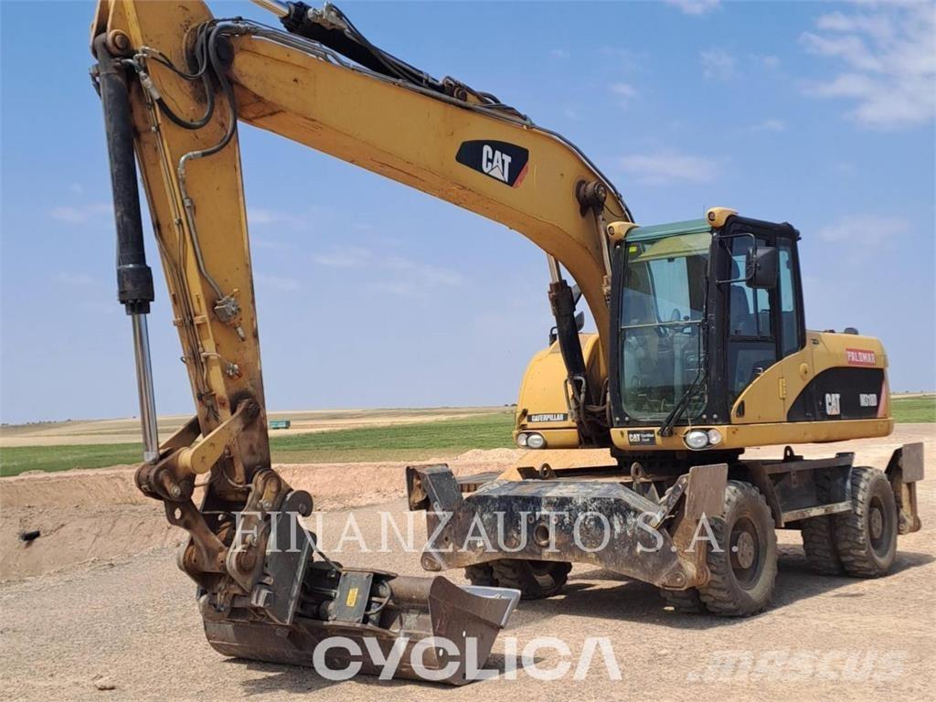 CAT M318D Bagri na kolesih
