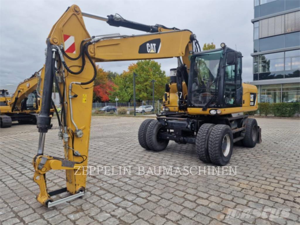 CAT M318D Bagri na kolesih