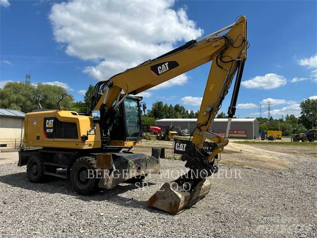 CAT M318F Bagri na kolesih
