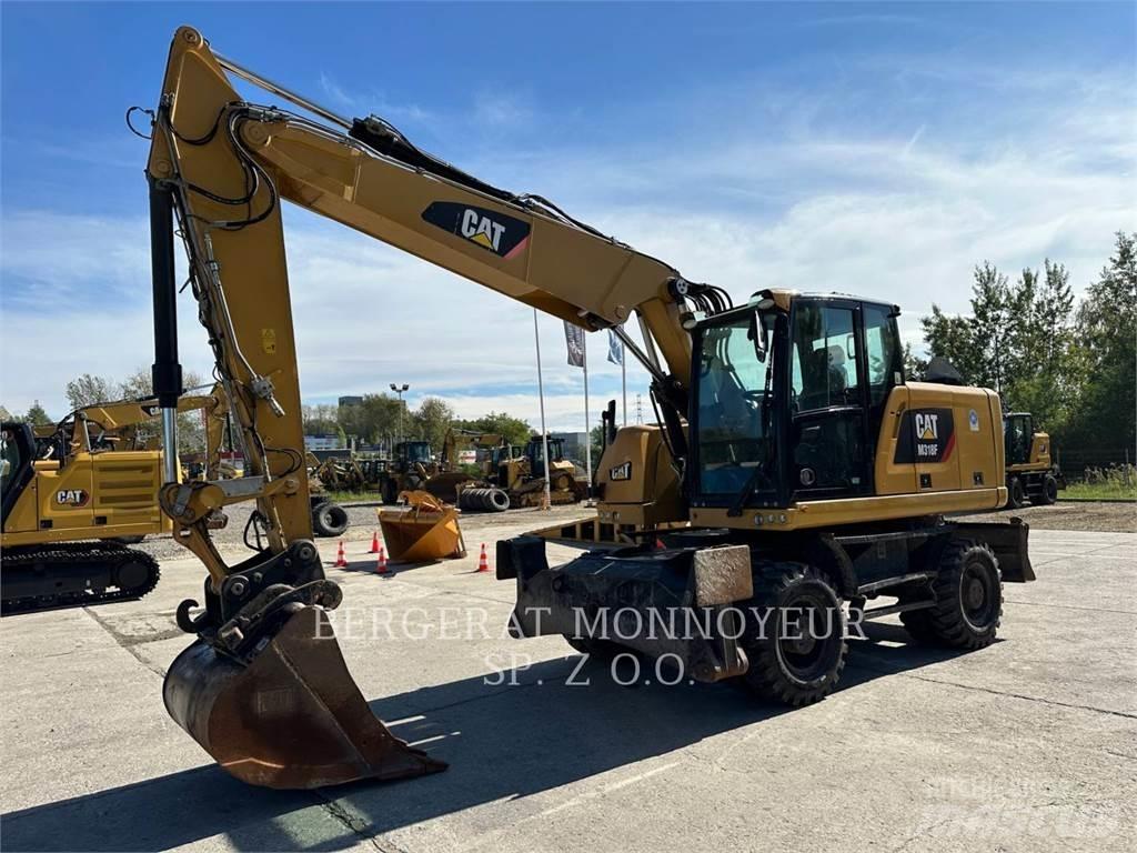 CAT M318F Bagri na kolesih