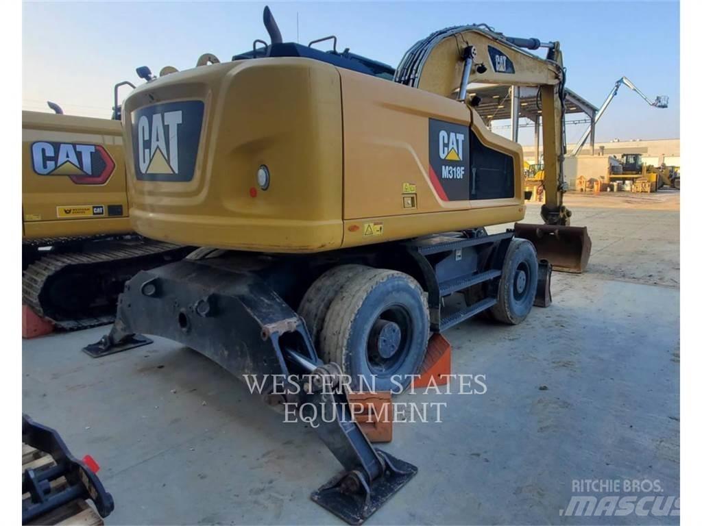 CAT M318F Bagri na kolesih