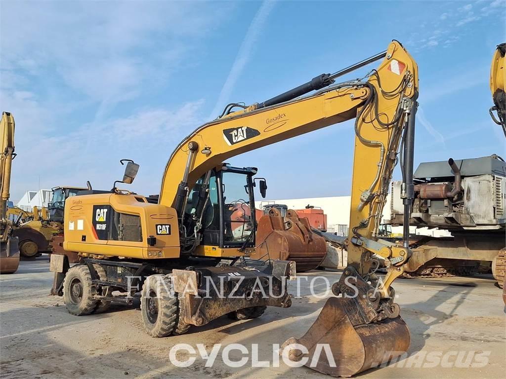 CAT M318F Bagri na kolesih