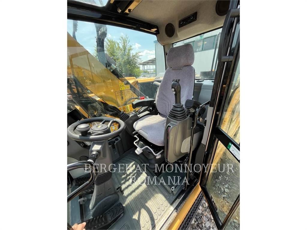 CAT M318F Bagri na kolesih