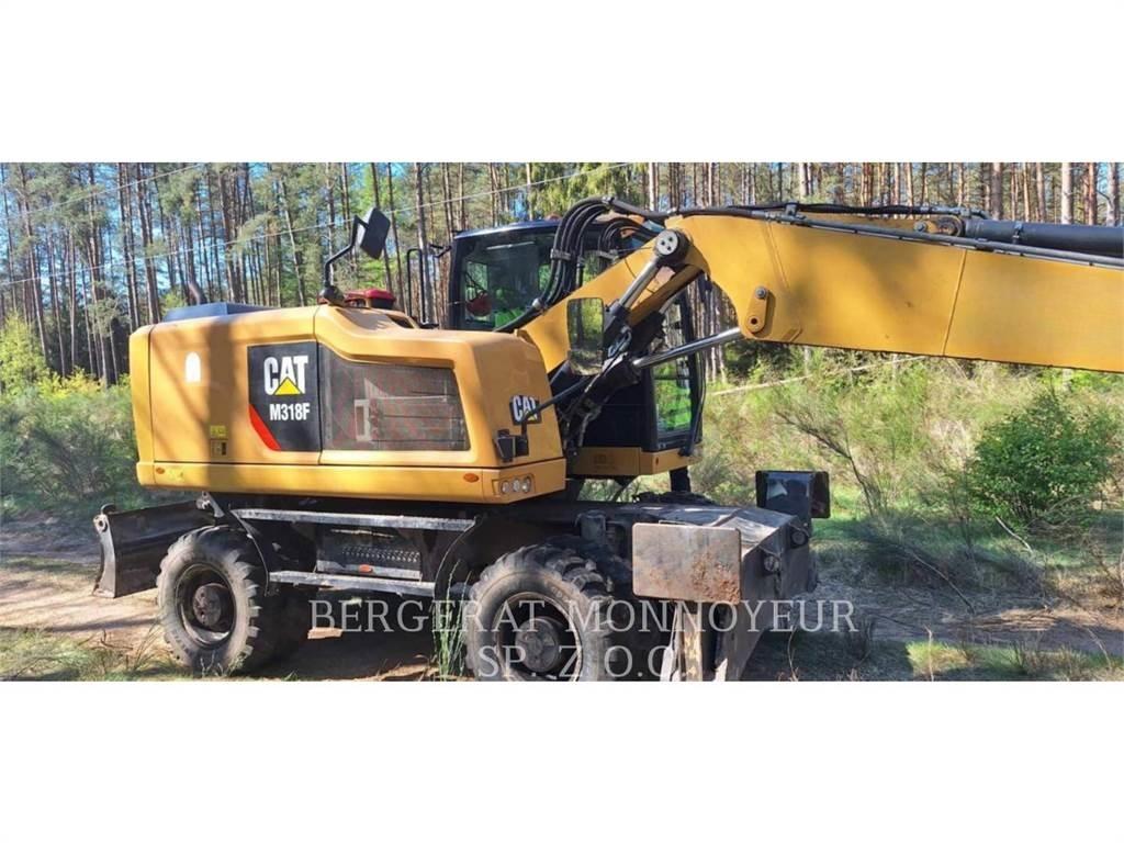 CAT M318F Bagri na kolesih