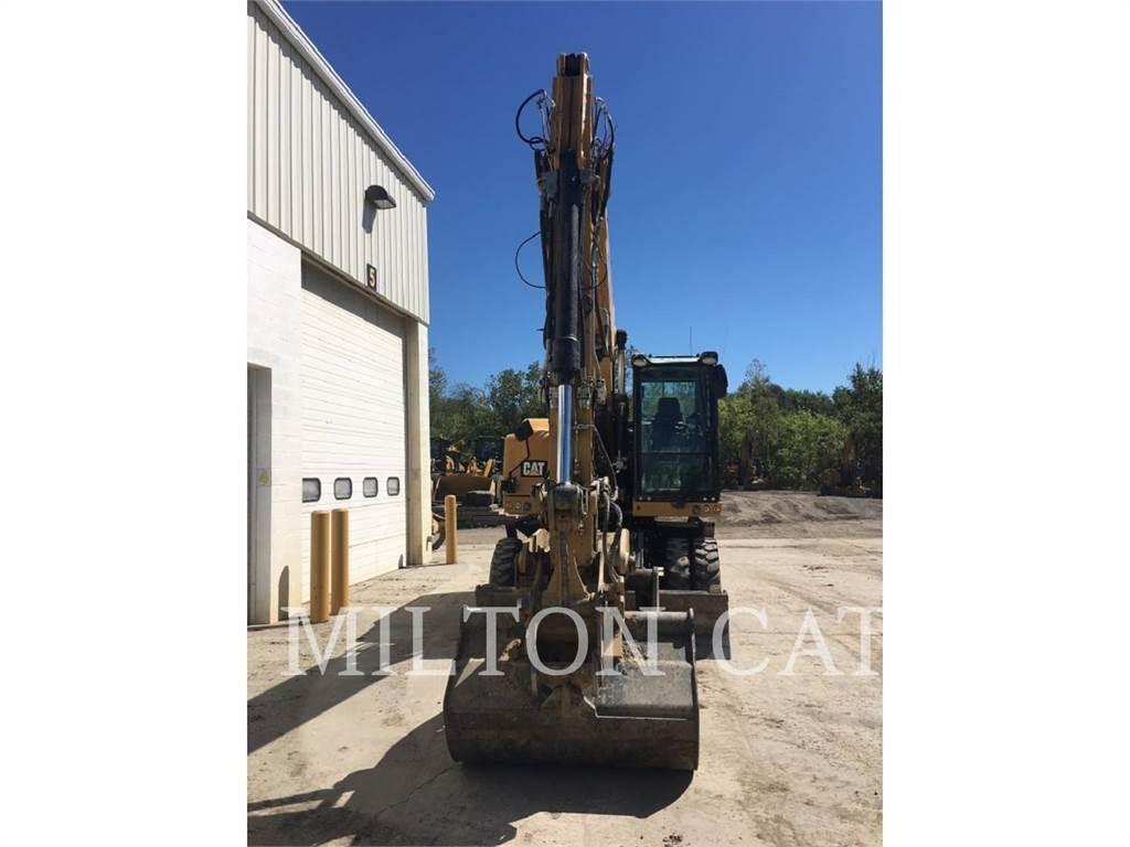 CAT M318F Bagri na kolesih